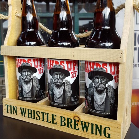 Tin Whistle Releases Hands Up Oatmeal Raisin Red Ale